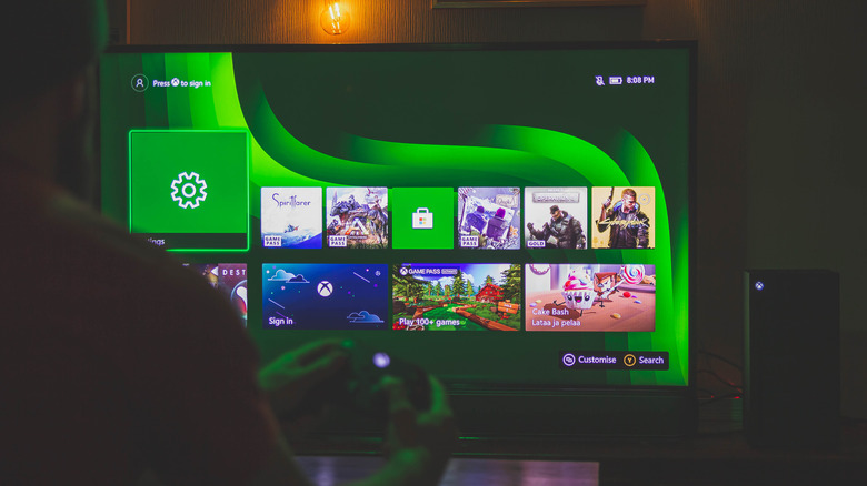 a person playing on an Xbox Series X console while not signed into their profile