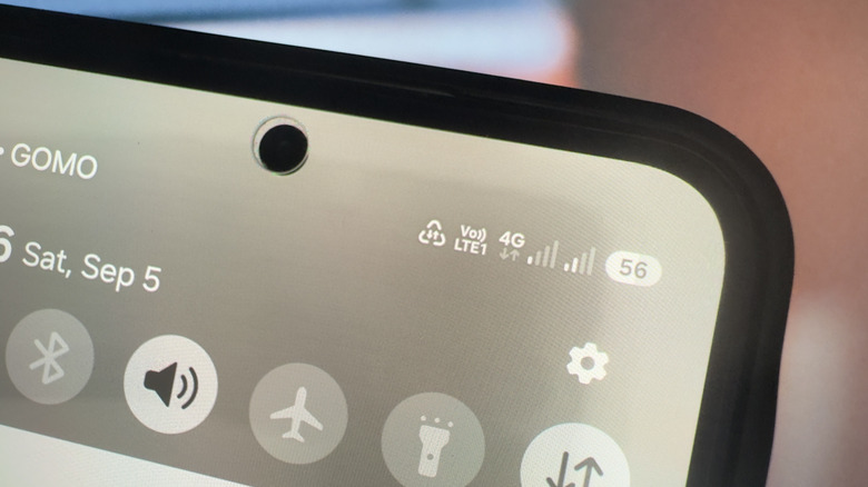 The Samsung phone status bar showing a triangle symbol