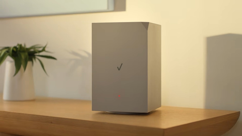 A Verizon Gateway router showing a red light.