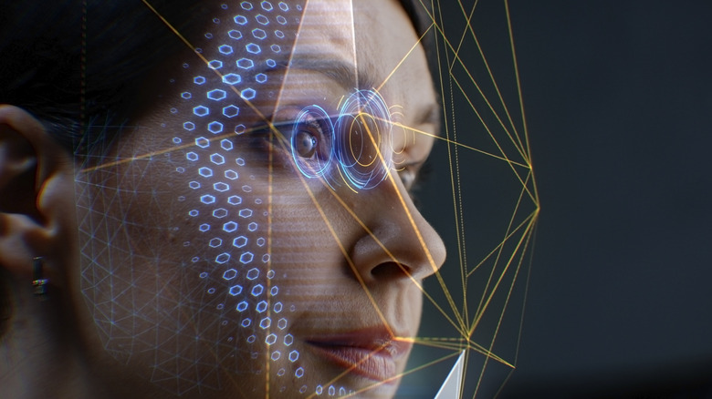 Woman using facial scan technology