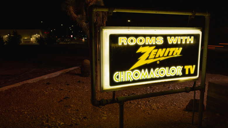 Hotel sign that advertises Zenith TVs in all stay rooms.