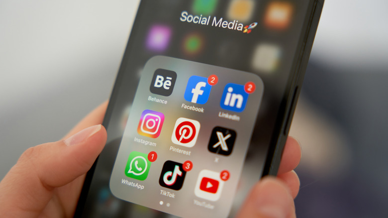 Social media app icons on a phone screen