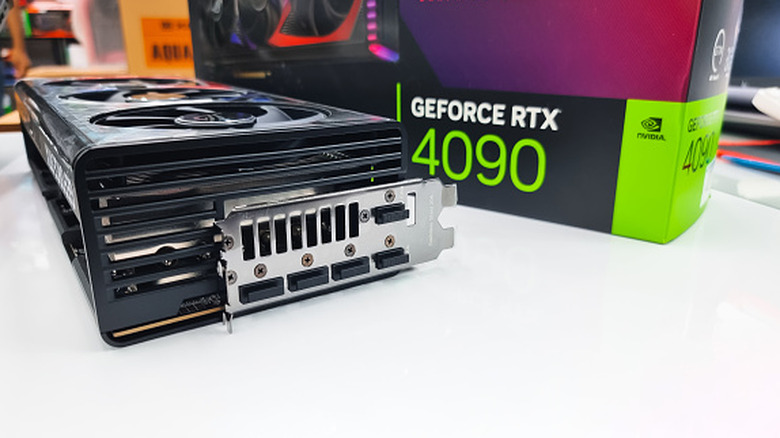 Nvidia RTX 4090 GPU in front of its box