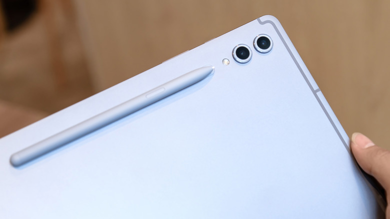 Holding Samsung Galaxy S10 Tab
