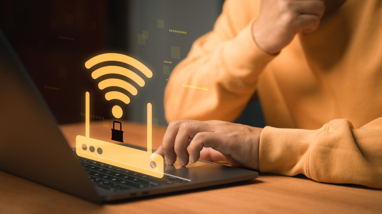 a symbol showing a router with protection and the Wi-Fi symbol by a computer
