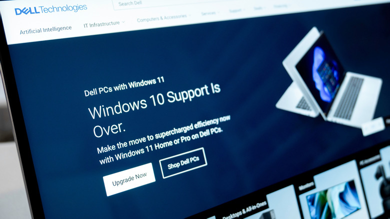 A monitor displaying a webpage with info about the end of support for Windows 10