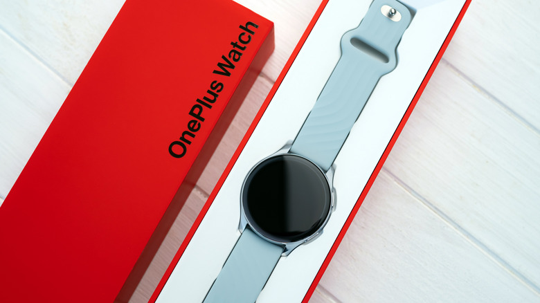 The OnePlus Watch within its original packaging