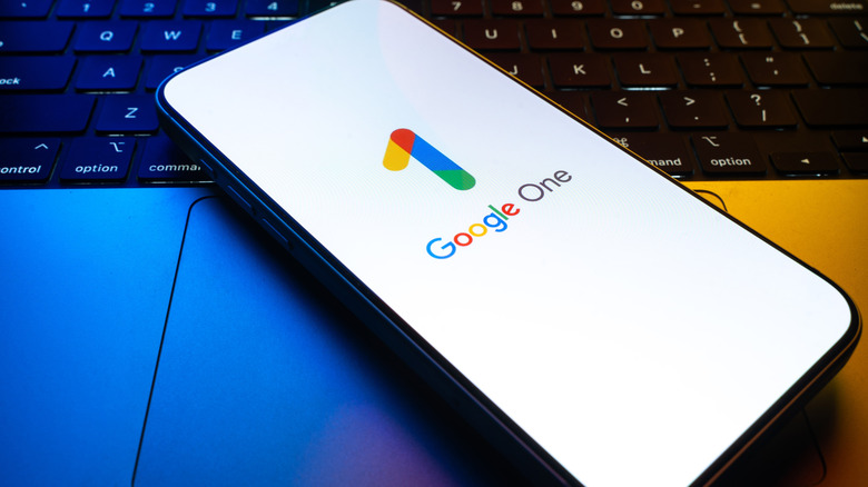 The Google One logo on a smartphone display.