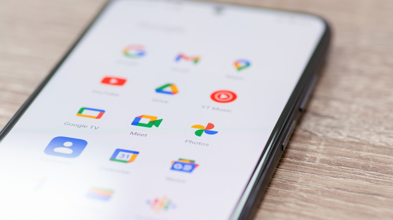 Several Google app icons on a smartphone display.