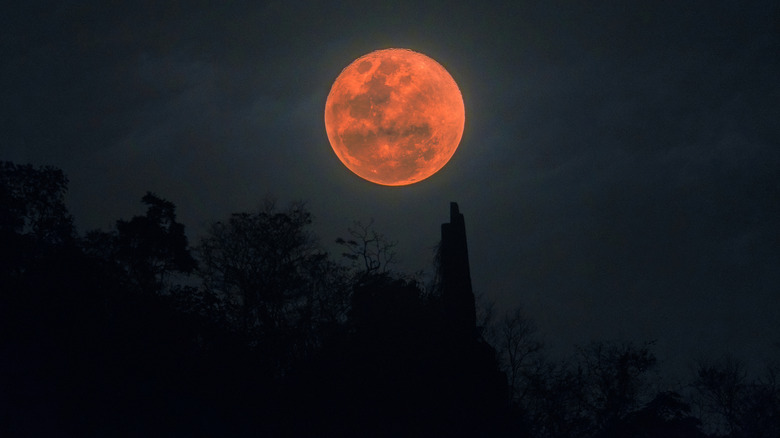 A blood moon over mountains in Thailand