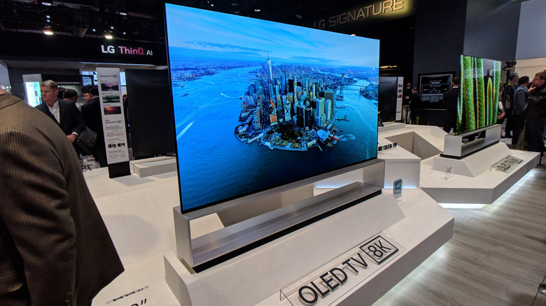An LG OLED TV displayed at an expo.