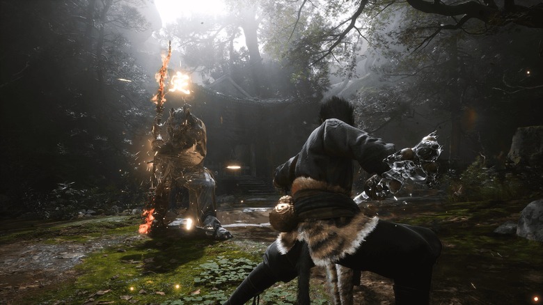 Wukong fighting an enemy in Black Myth Wukong