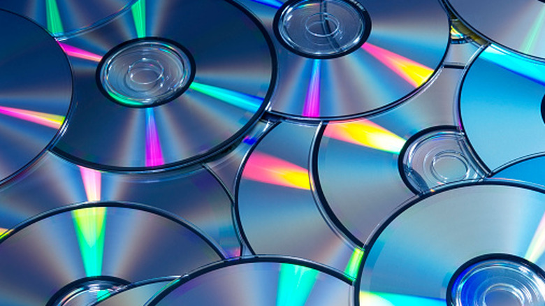 Pile of DVD discs with read side facing up