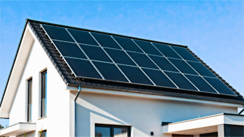 Solar panels on rooftop of house.