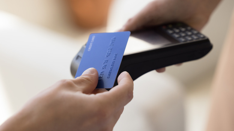 Close-Up of someone making a purchase with a credit card