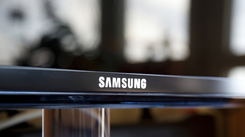 A close-up image of the side of a Samsung TV placed on a flat surface.