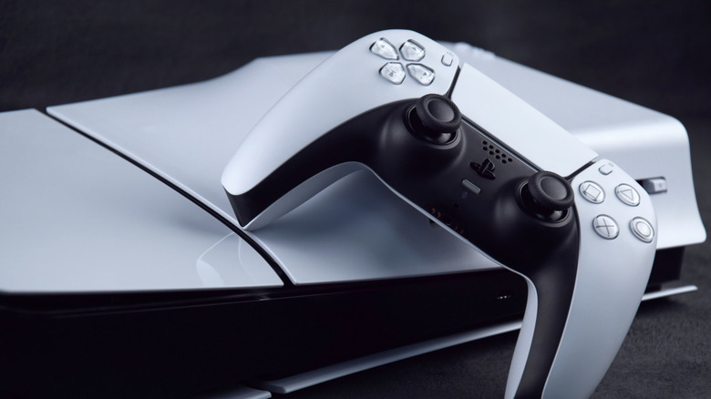 A PlayStation 5 DualSense controller on top of a PS5