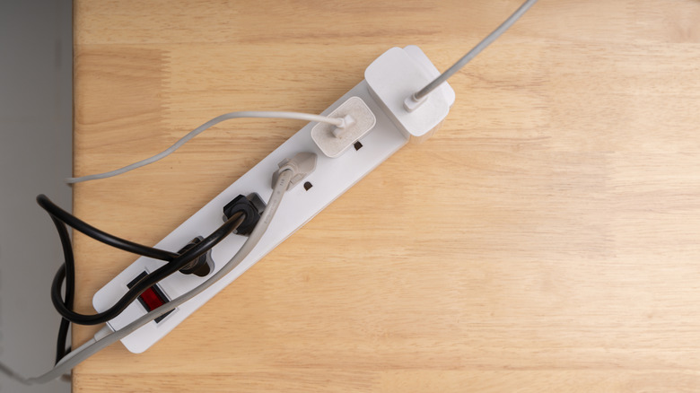 Power strip with multiple plugs connected.