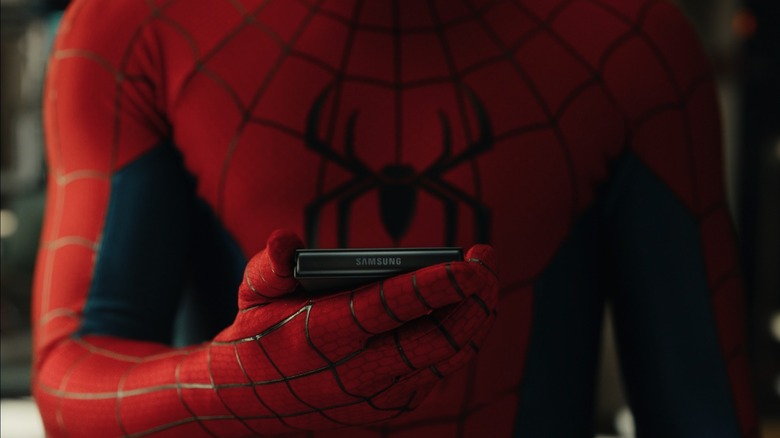 Spider-Man holding the Galaxy Z Flip 8 in a Samsung commercial made for 