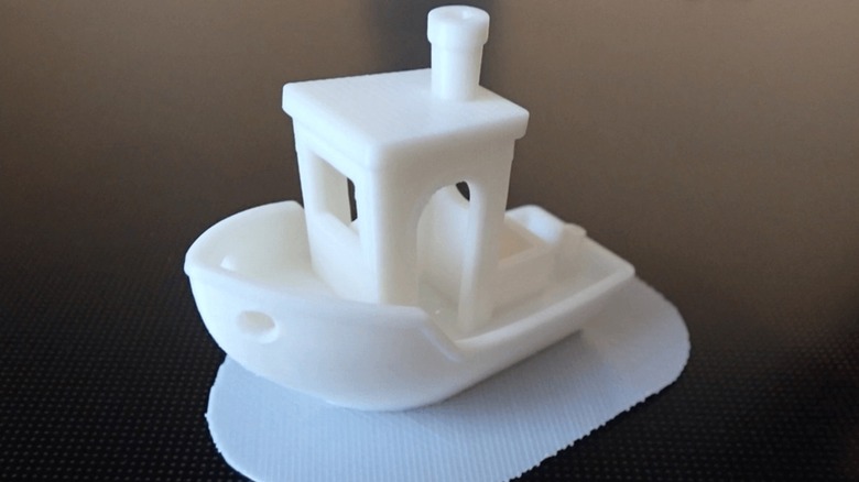 White 3D printed boat with a raft