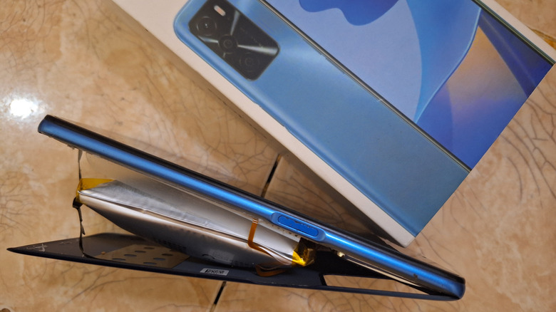 An Android phone with a swollen battery.