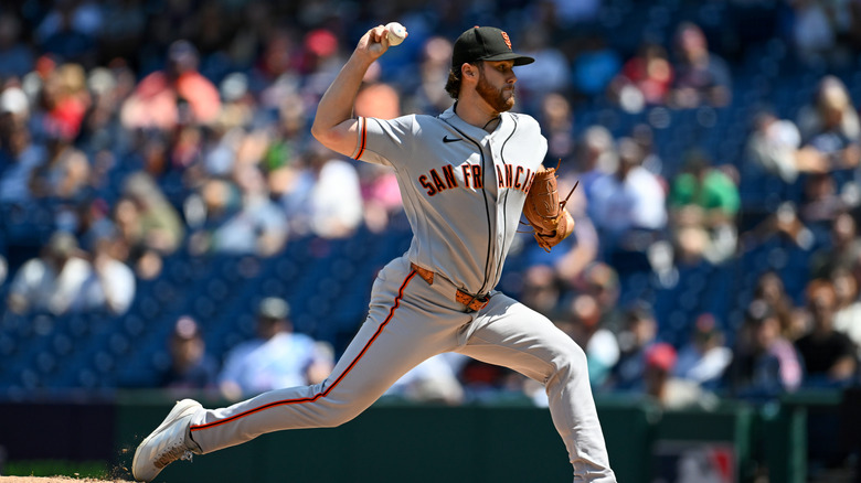 A San Francisco Giants player throwing a pitch