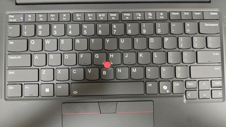 top-down view of lenovo laptop with trackpoint and trackpad both visible