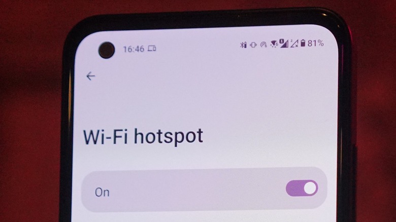 An Android phone indicating that it is connected to a Wi-Fi 6 network