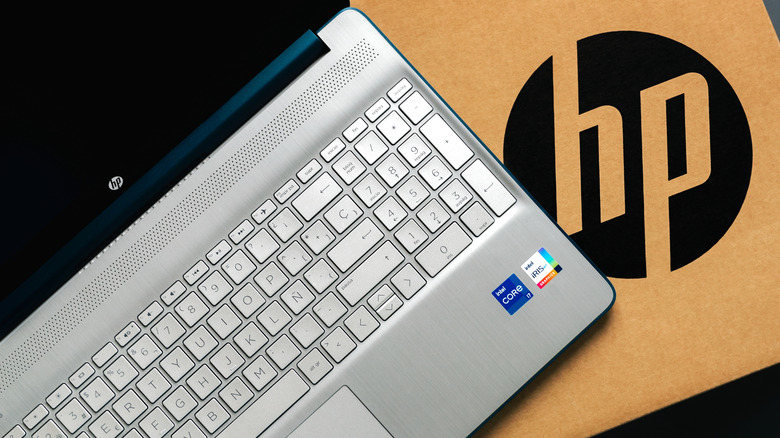 hp laptop placed a cardboard box with the HP logo