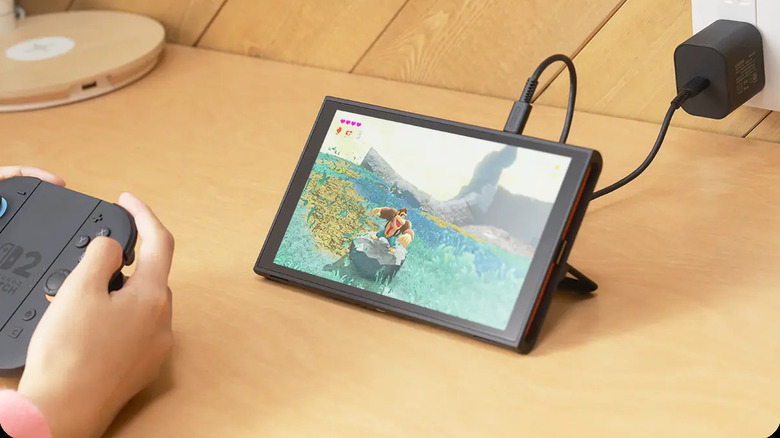 Nintendo Switch 2 charging through top USB-C port in tabletop mode while gaming