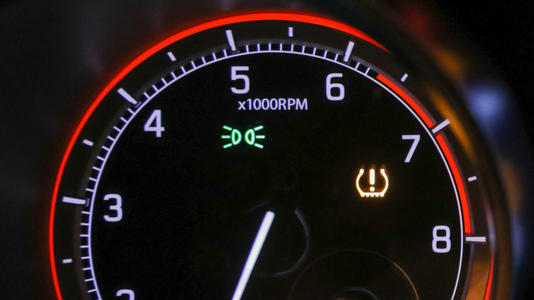 Low tire pressure warning light on a car's dashboard