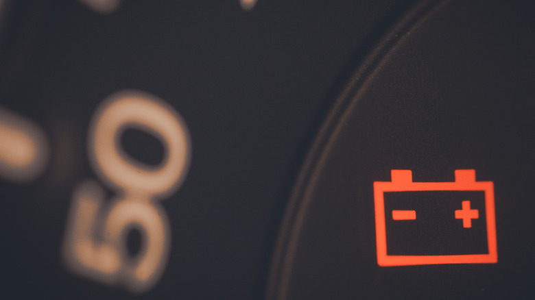 Red battery light on an EV dashboard