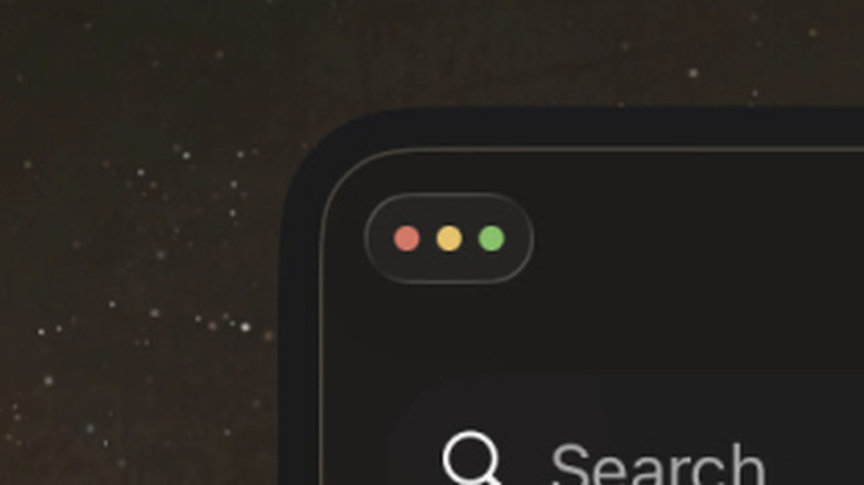 Zoomed-in screenshot of the top left of an iPad app showing three buttons colored red, yellow, and green