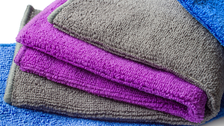A stack of microfiber cloths for household cleaning.
