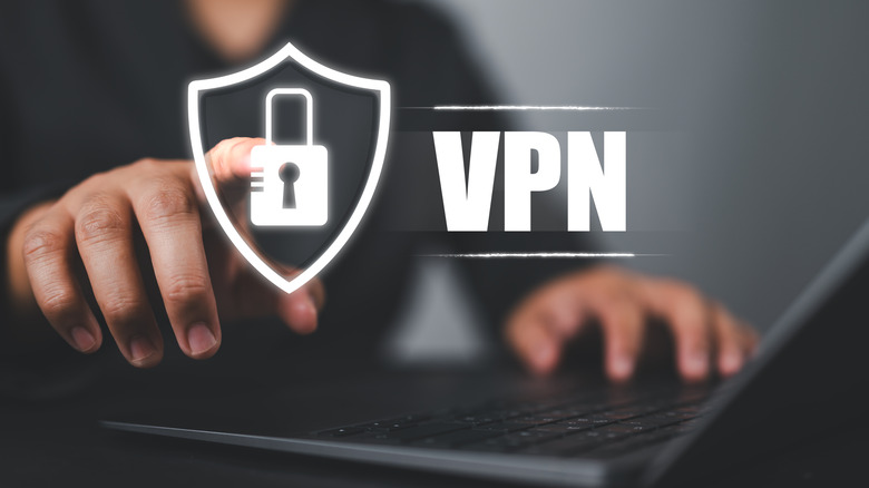 VPN with padlock logo displayed above a laptop.