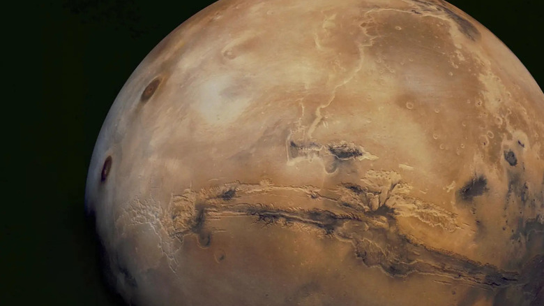 Surface of Mars with space in the background