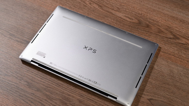back of dell XPS laptop, face down on a table