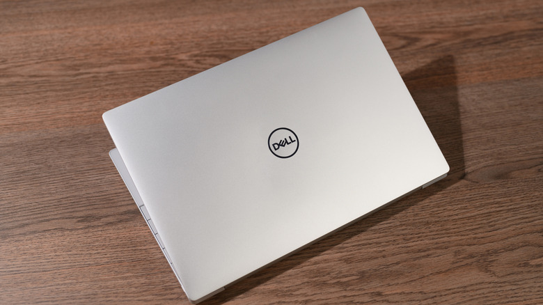 Dell XPS 13 laptop partially opened on a table