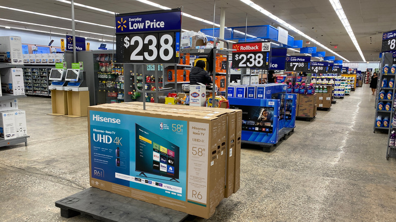 Various TVs on sale at a Walmart store