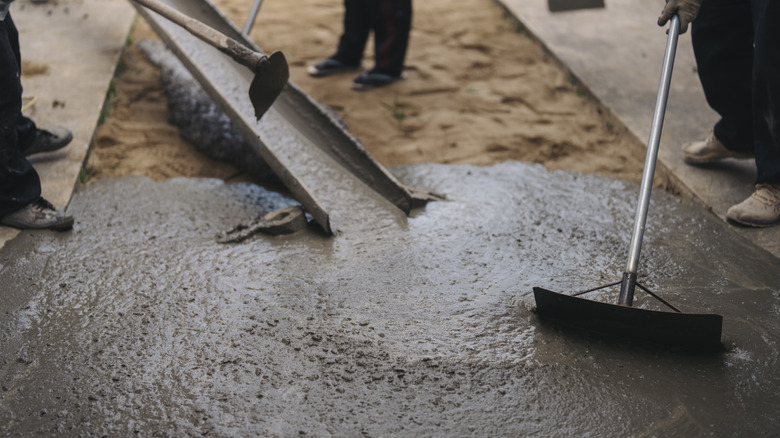 Image of a construction site where concrete is being laid