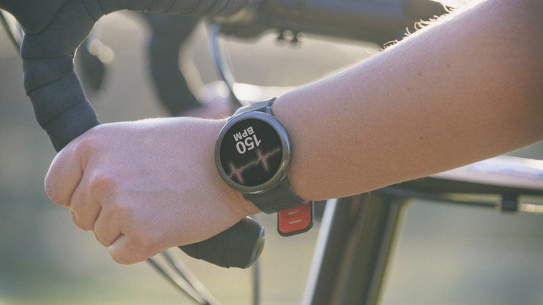 A person wearing a Amazfit smartwatch.