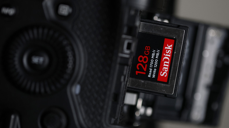 An SD card inserted into a camera