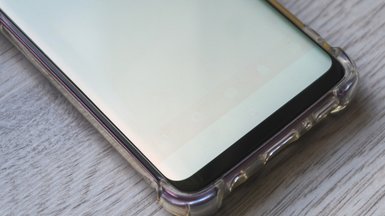 Faint screen burn-in visible on a Samsung smartphone display near the navigation bar icons