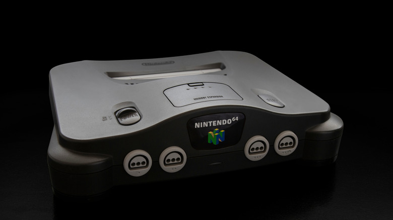 a Nintendo 64 on a black background