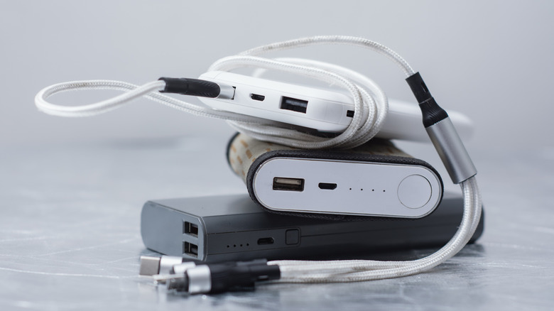 a stack of three portable power banks