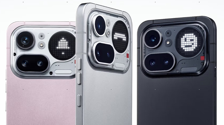The top half of three Nothing Phone (4a) Pro handsets.