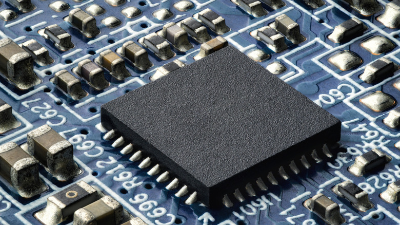 Close-up of a semiconductor on a circuit board.
