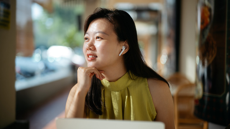 Person on call with AirPods