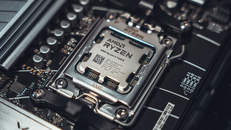 An AMD Ryzen 5 7600X processor socketed into a motherboard