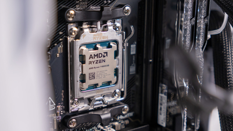 An AMD Ryzen 7 9800X3D socketed into a motherboard